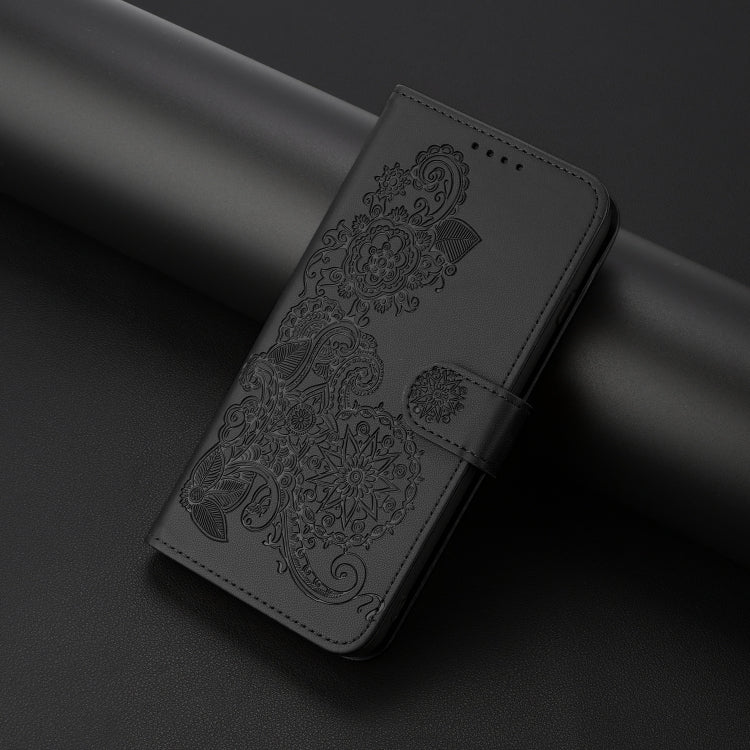 For iPhone 16e Datura Flower Embossed Flip Leather Phone Case(Black) - iPhone 16e Cases by PMC TechLife | Online Shopping South Africa | PMC TechLife | Buy Now Pay Later Mobicred