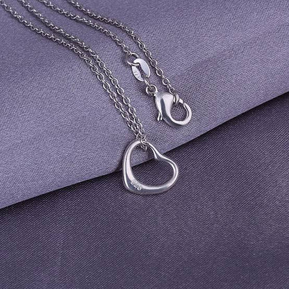 Simple Heart Necklace In 18k White Gold